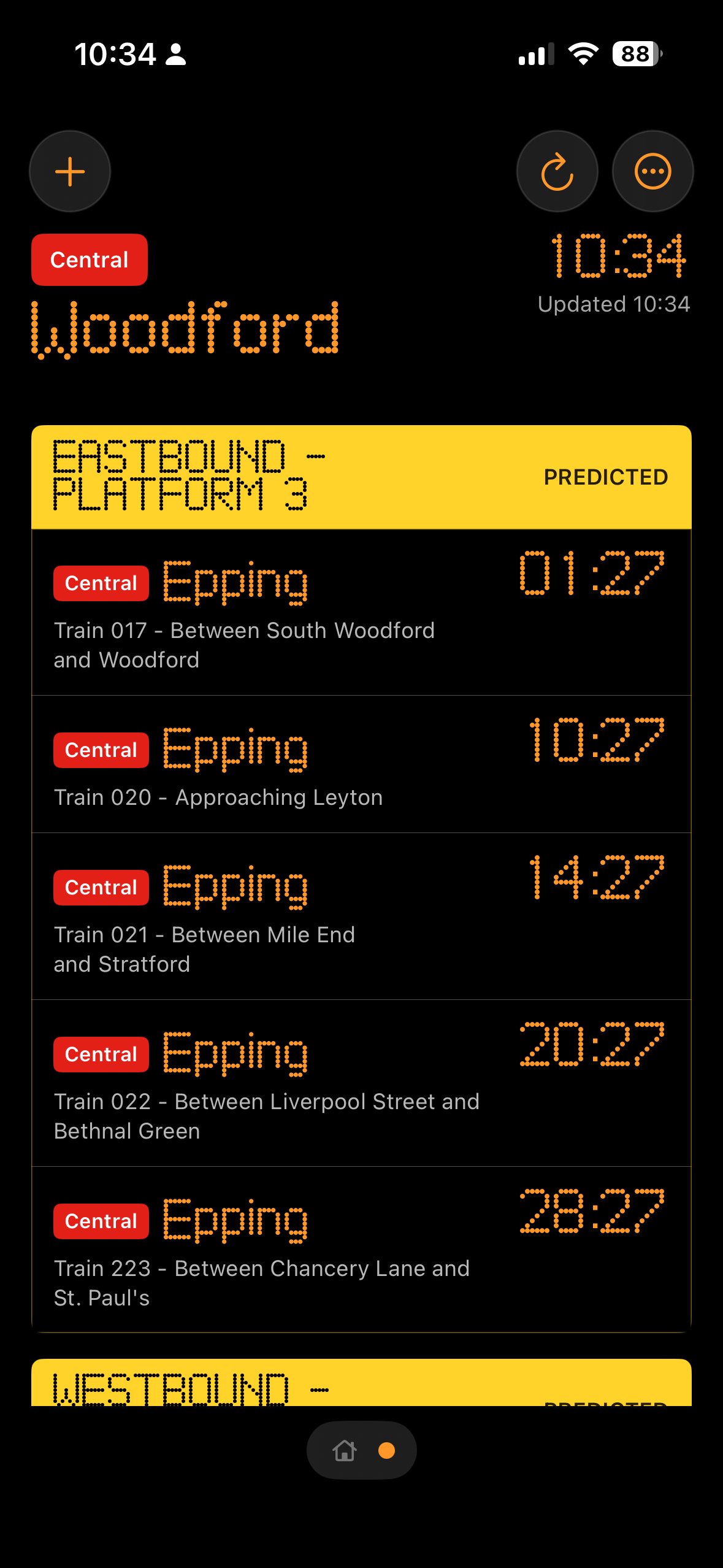 TubeBoard app showing Central line arrivals at Woodford